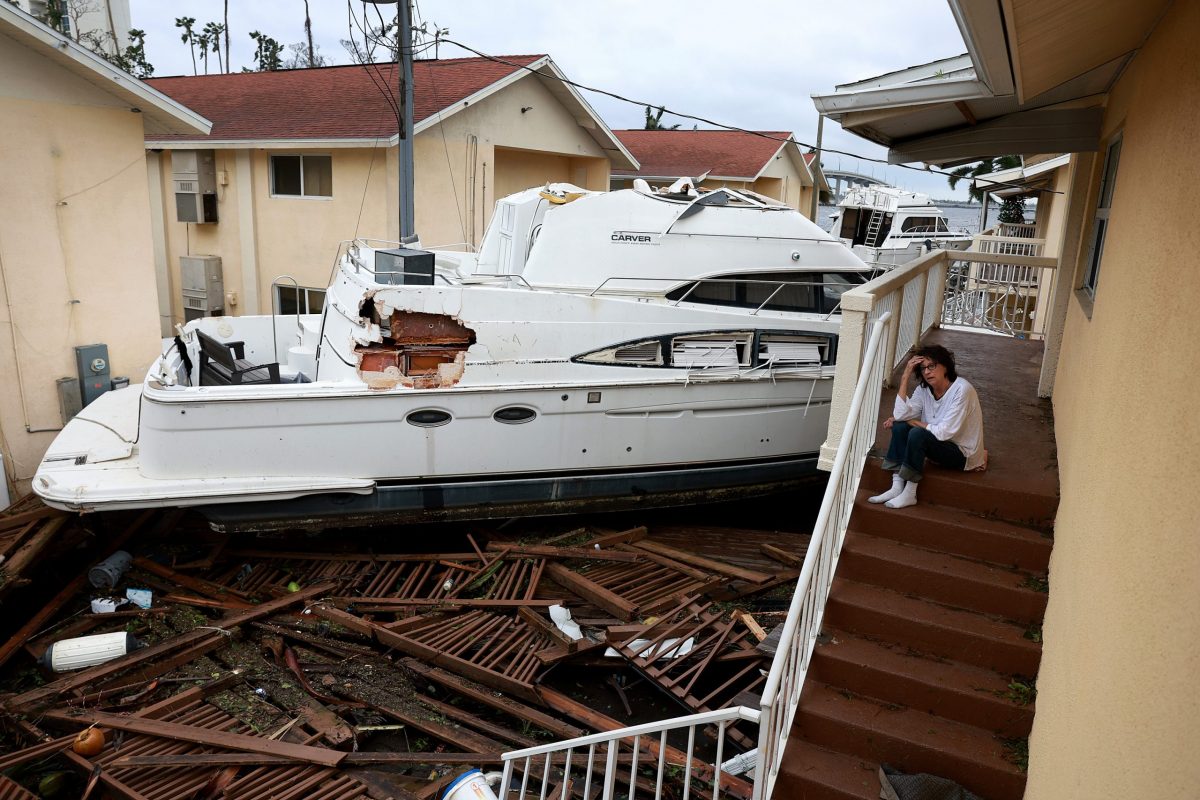 Mudança climática fotojornalismo furacão EUA barco 