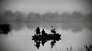 Homens pescando em uma lagoa foi foto de natureza vencedora na categoria Old Florida Charm