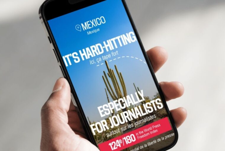 Celular exibindo campanha denunciando destinos turísticos de países perigosos para jornalistas